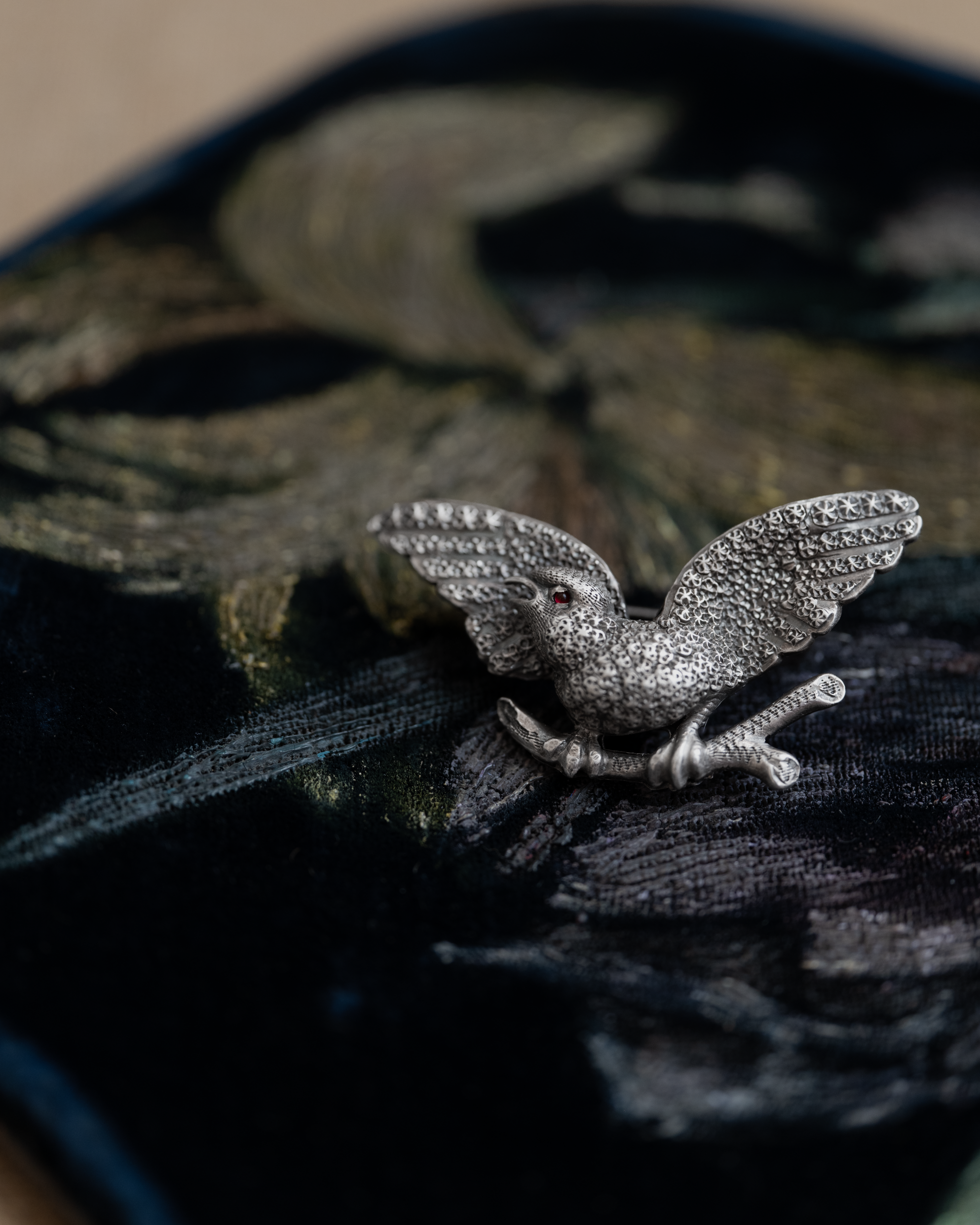 Flying Red Eye Bird Silver Brooch