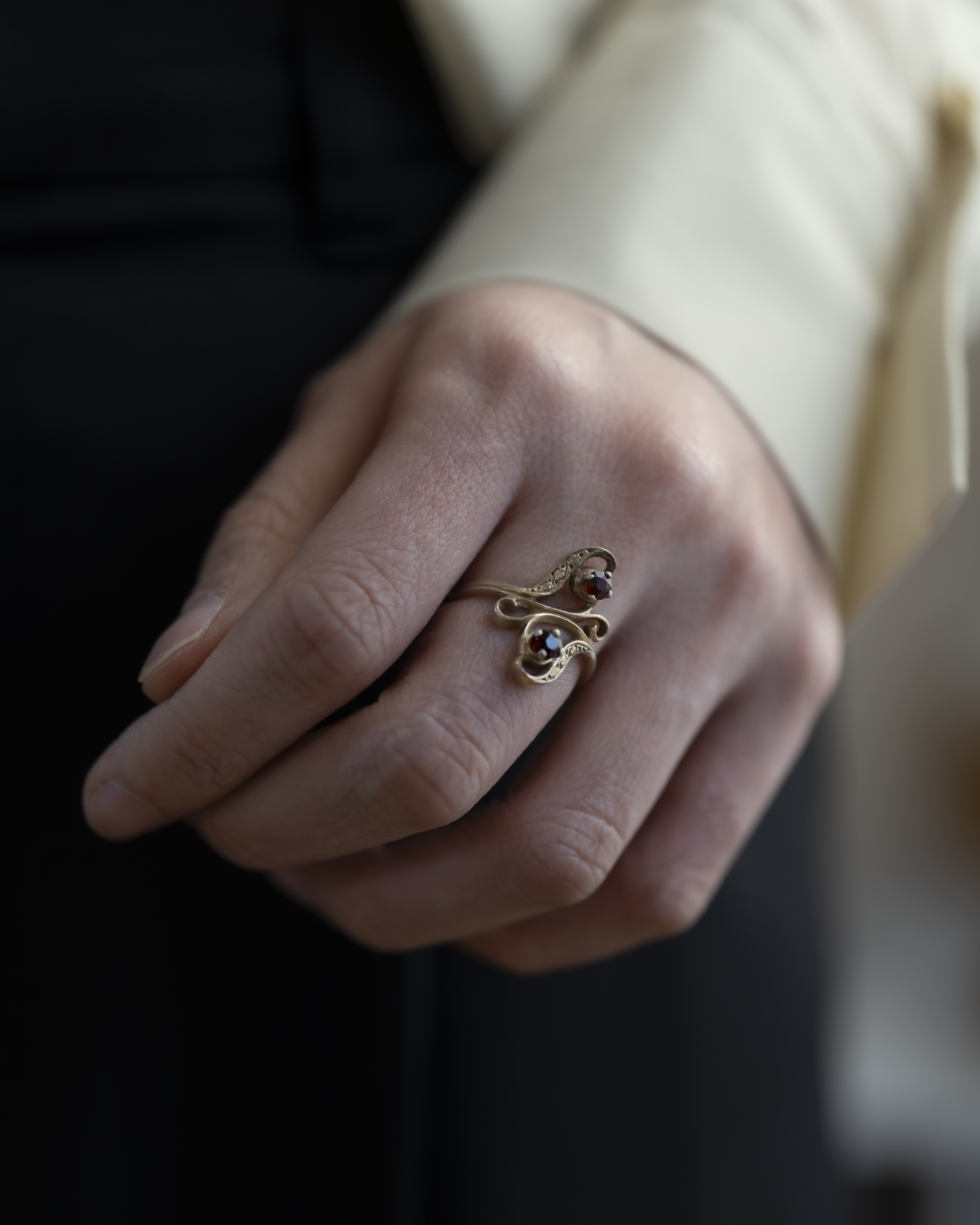 Garnet and Gold Plated Ring with Romantic Curves